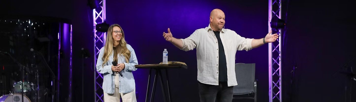 A pastor teaching on stage